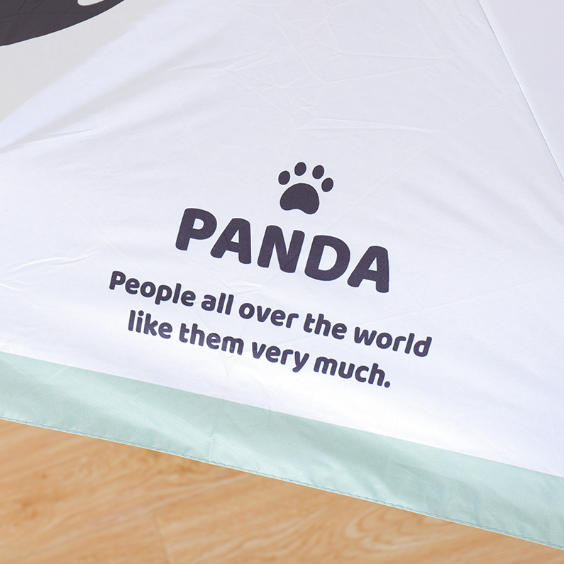 The panda folded his parasol in half