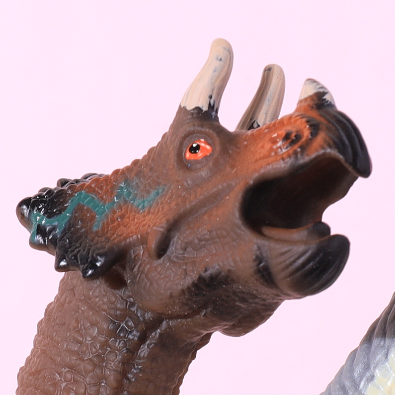 Dinosaur finger doll