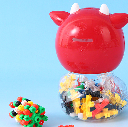 Building Blocks with Cute Red Cow Shaped Container