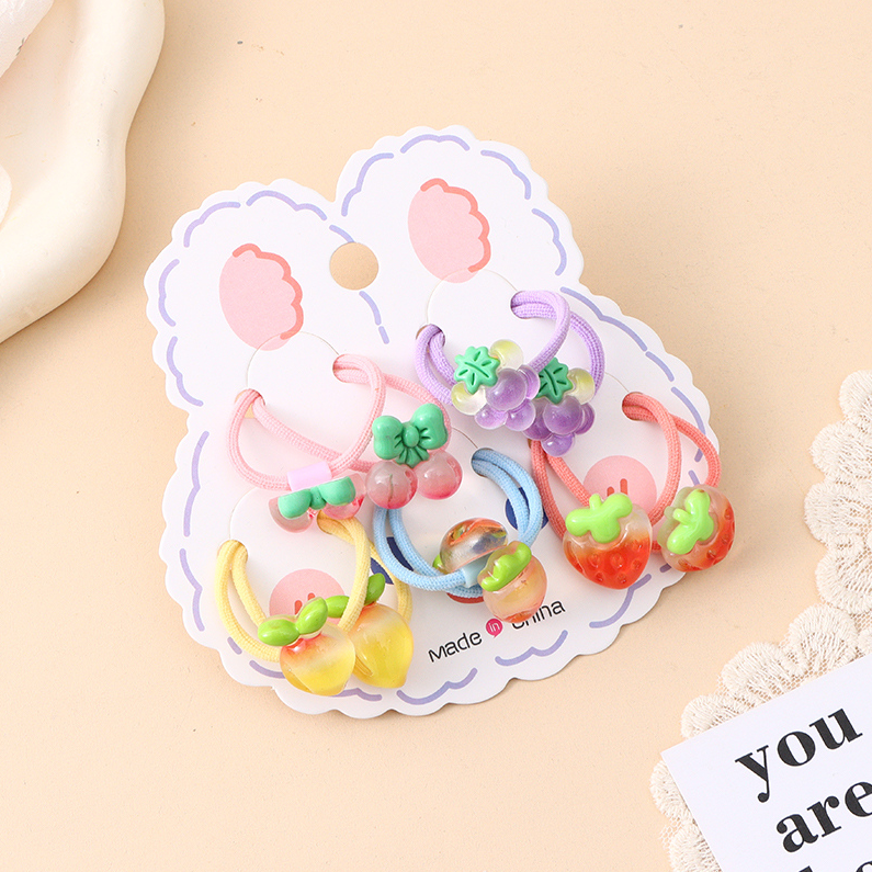 Fruit and vegetable bands on a card