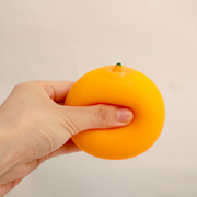 Three pieces of orange stress-relieving Pinching Fun (Orange)