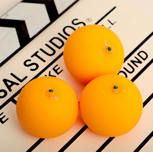 Three pieces of orange stress-relieving Pinching Fun (Orange)