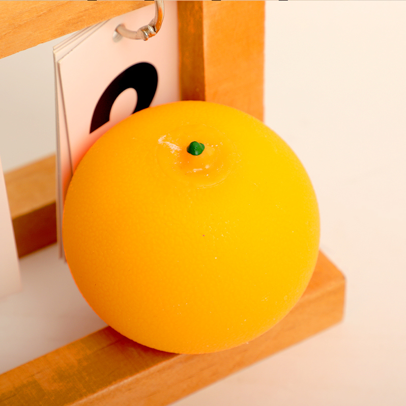 Three pieces of orange stress-relieving Pinching Fun (Orange)