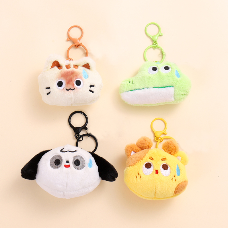 The animal presses the rattle plush pendant
