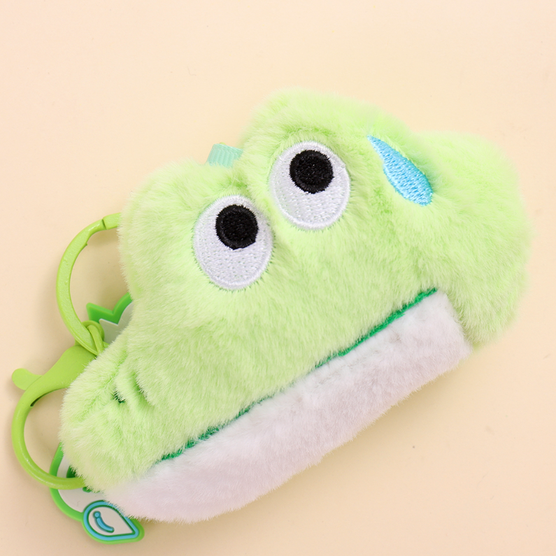The animal presses the rattle plush pendant