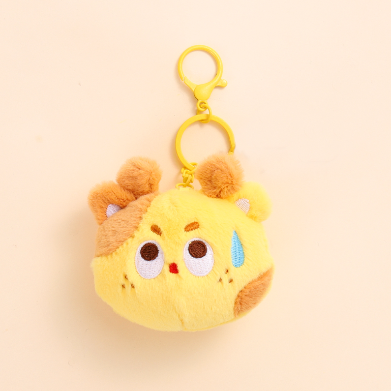 The animal presses the rattle plush pendant