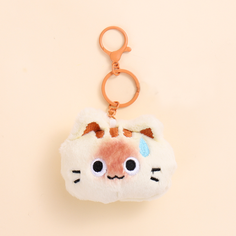 The animal presses the rattle plush pendant
