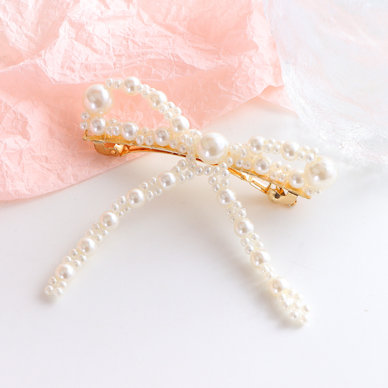 Hand woven bow hair clip