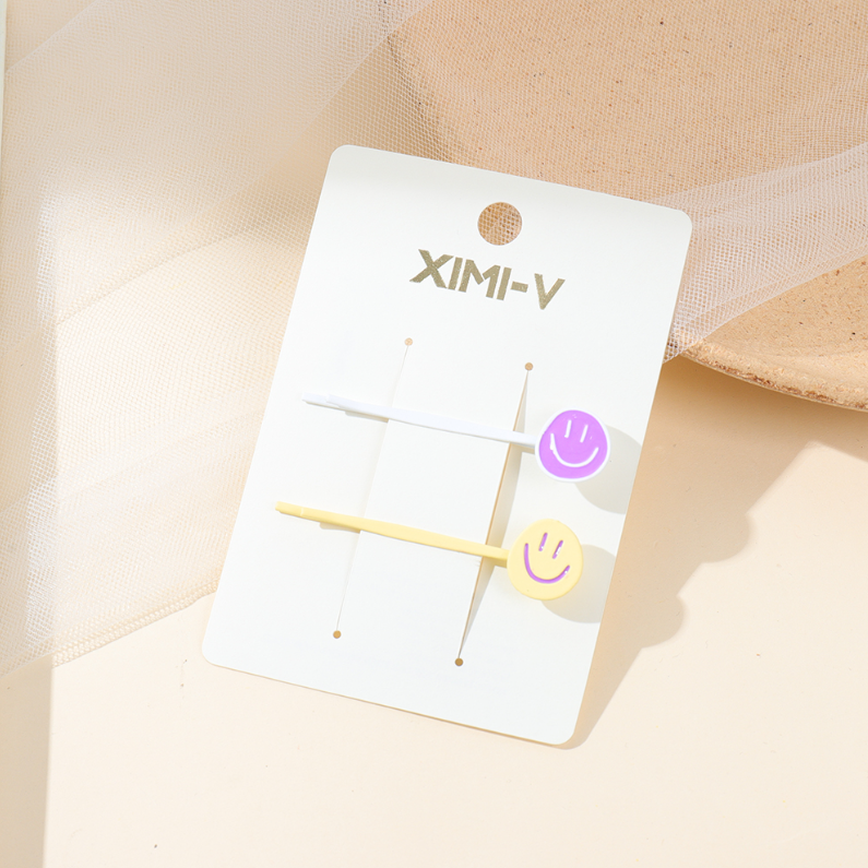 Colorful smiley face clip