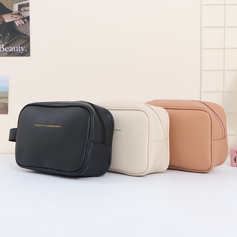 Solid-color double-sided leather side-carry cosmetic bag