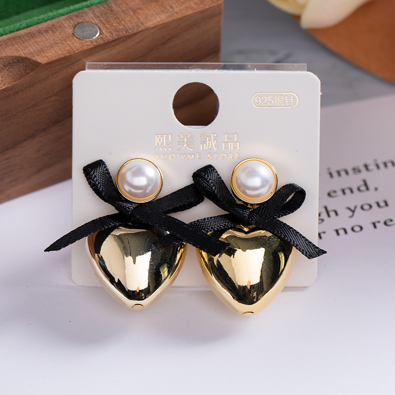 Featured love bow earrings