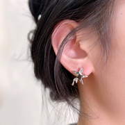 Cool black pick five-pointed star earrings